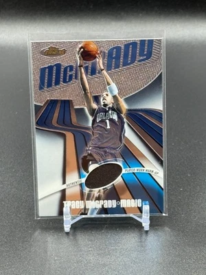 2004 Topps Finest #111 Tracy McGrady Game Worn Warm-ups #/999 MAGIC - Image 1 of 2