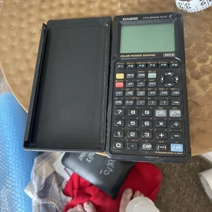 Casio CFX-9850Ga Plus Black Color Graphing Scientific Calculator - Picture 1 of 5