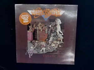 Toys in the Attic by Aerosmith sealed vinyl Record Hype Sticker - Picture 1 of 3