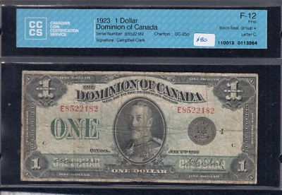 1923 Dominion of Canada $1 DC-25o. CCCS F-12 - Black Seal. S/N: E-8522182/C  A19 - Image 1 of 2