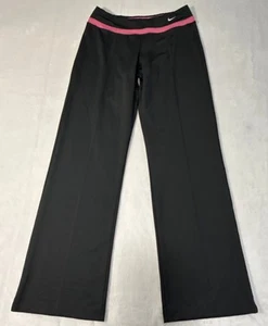 Pantalones deportivos Nike Dri Fit medianos para mujer - Imagen 1 de 14