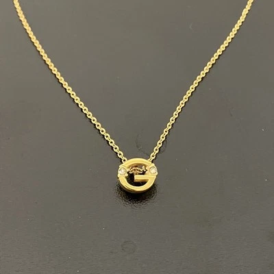 Collar con logo dorado de GIVENCHY y accesorio de piedra auténtico Foto 1 de 4