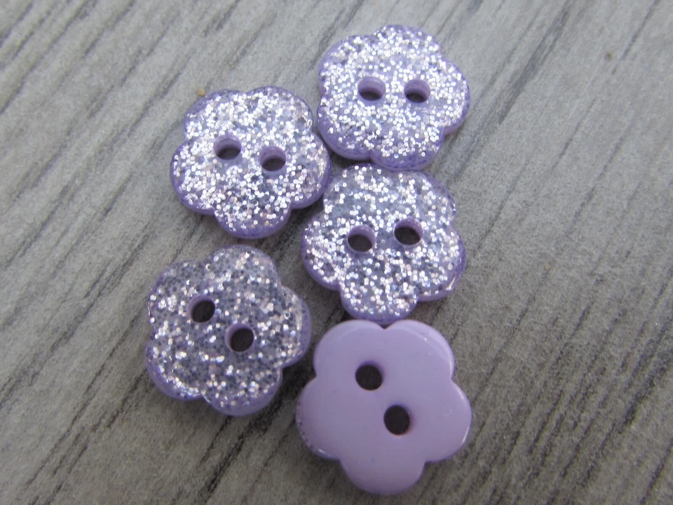 15mm Lilac Glitter Flower Buttons 2 Hole Sew On In Pack sizes of 5, 10 or 20 - Image 1 of 1