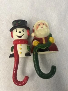 Vintage Stocking Hangers Snowman Santa Claus Christmas Set of 2 Sun Hill 1982 - Picture 1 of 6