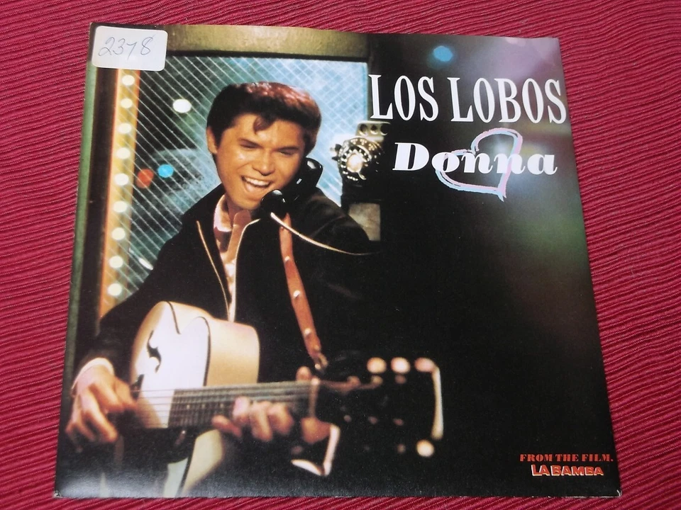 Los Lobos:    Donna    7"  Mint Unplayed (sticker on slv) Foto 1 de 2