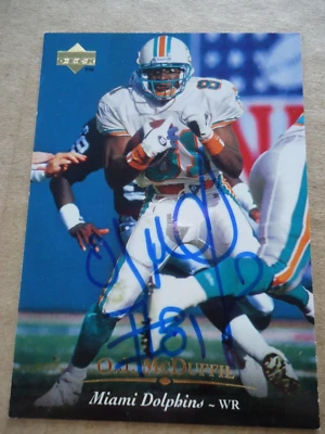O.J. McDuffie - 1995 U.D. Autographed Football card #75- Miami Dolphins - WR - Image 1 of 2