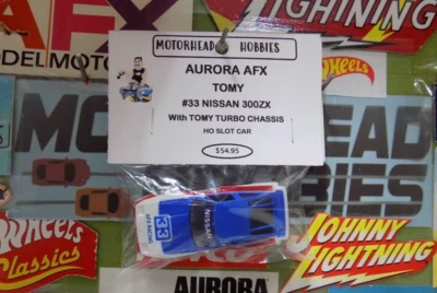 AURORA AFX TOMY, #33 NISSAN 300ZX, CHASIS TOMY TURBO, HO SLOT CAR Foto 1 de 4