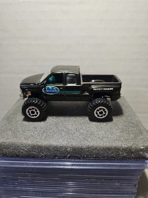 Chevrolet Silverado 1999 Matchbox negro 4x4 Game Warden Foto 1 de 4