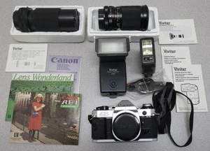 Canon AE-1 Program Camera con 2 obiettivi vivitar - 2 flash vivitar - non testata - Foto 1 di 15