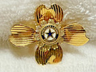 Vintage American Legion Auxiliary gold-tone flower pin with rhinestones