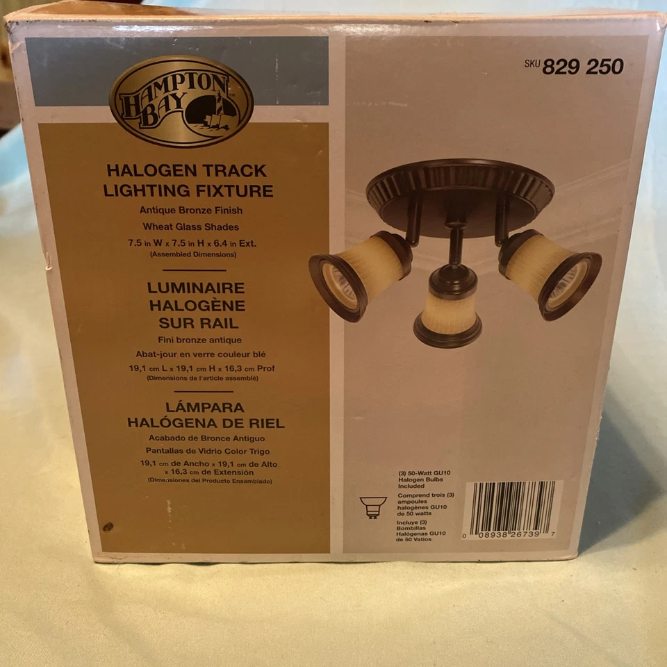 Lámpara de iluminación halógena de pista Hampton Bay. Cualquier acabado bronce, pantalla de vidrio de trigo Foto 1 de 4