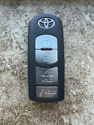 TOYOTA YARIS iA 2017-20 mando a distancia llave inteligente FCC: WAZSKE13D02 (4 BOTONES) ¡Como nuevo! Foto 1 de 3