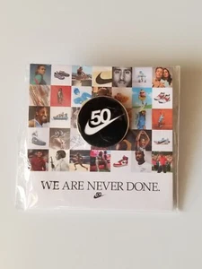 NEW NIKE SWOOSH 50th ANNIVERSARY COLLECTIBLE PIN BLACK WHITE - WE ARE NEVER DONE - Picture 1 of 2