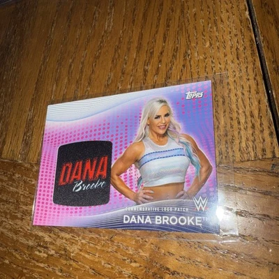 2021 WWE Women's Division Superstar Logo Relics Pink 96/150 Dana Brooke Patch - Image 1 of 2
