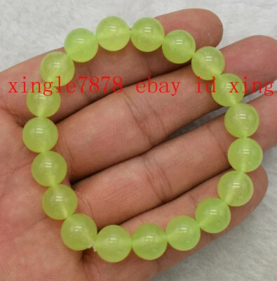 Natural 6/8/10/12/14mm Green Peridot Round Gemstone Beads Bracelet 7.5'' AAA+ - Image 1 of 4