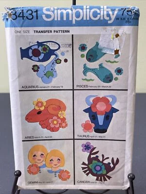 1969 Uncut FF Simplicity 8431 12 Zodiac Applique Transfers No Sew Hippie Fashion - Image 1 of 4
