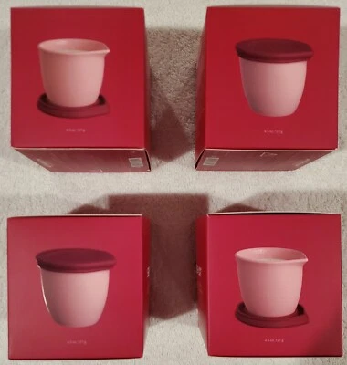 4 velas de aceite de masaje JimmyJane AFTERGLOW. Precio de venta sugerido por el fabricante 220,00 USD en aroma a rosa bergamota Foto 1 de 4