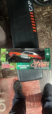 1/18 ERTL American Muscle RACING CHAMPIONS JOHN FORCE 1969 GTO 1 DE 2084 Foto 1 de 4