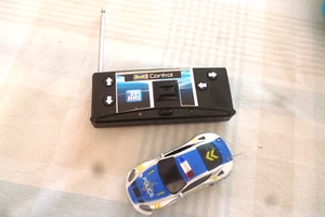 Mini RC Police Polizeiauto Rewell Licht Ferngesteuert Auto ca.8cm gross - Bild 1 von 3