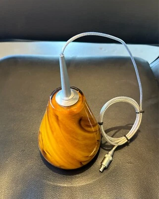 Colgante de iluminación Bruck con pantalla de vidrio ámbar de la colección Lucy Foto 1 de 4