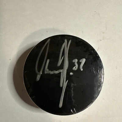 Disco de práctica autografiado por Olaf Kolzig, Washington Capitals Foto 1 de 3