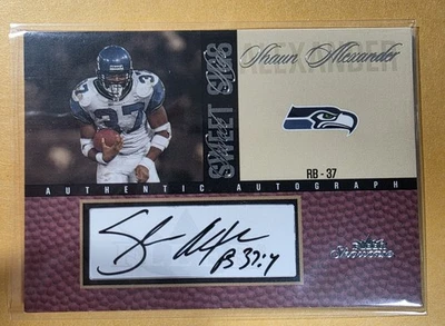 2004 Fleer Showcase Shaun Alexander on card Auto  /100 Seattle Sehawks - Image 1 of 4