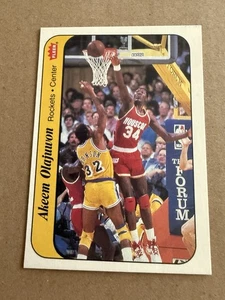 1986-87 Fleer Sticker #9 Akeem Olajuwon Rookie Houston Rockets NMT Mint NBA Card - Picture 1 of 2