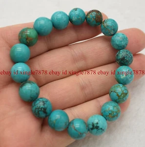 "Brazalete elástico redondo de piedras preciosas azul turquesa natural genuino de 12 mm 7,5" - Imagen 1 de 12