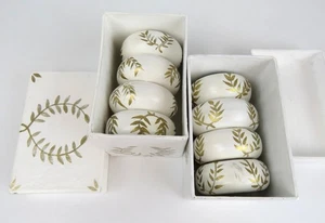 Juego de 8 servilleteros de madera pintados a mano tono oro blanco HomeTrends - Imagen 1 de 8