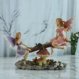 7.75"W Pink and Purple Fairy on Seesaw Figurine - Picture 1 of 1