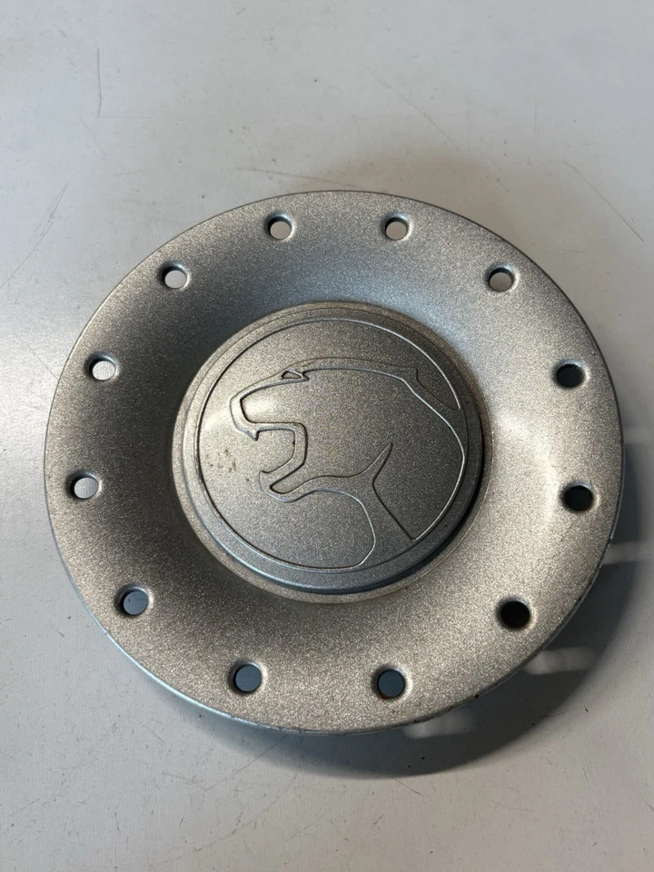 Tapa central Mercury Cougar 2001-2002 (P3434) 1581-1000-CA Foto 1 de 3