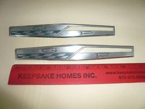 1960's PONTIAC GRAND PRIX GP EMBLEM #4888834 - Pair OEM - Picture 1 of 3