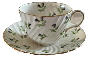 Taza de té y platillo Aynsley #15287 hojas verdes de cardo púrpura con borde dorado años 30 - Imagen 1 de 9