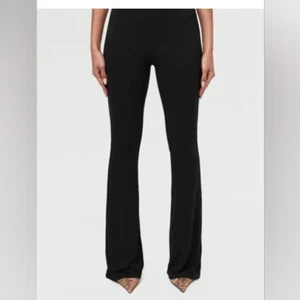 Naked Wardrobe schwarze Schlaghose Misses Größe L - Bild 1 von 8