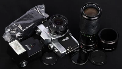 Minolta SR-T 201 Chrome 35mm Film SLR c/w 28/2.8, MC 100-200mm Lens & Flash Kit - Image 1 of 4
