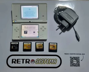 Nintendo Dsi Console Bianca + caricatore e 4 giochi perfettamente funzionante - Foto 1 di 3