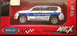 WELLY MODEL 1:35 AUTO POLIZIA ISRAELIANA TOYOTA LAND CRUISER PRADO - Foto 1 di 1