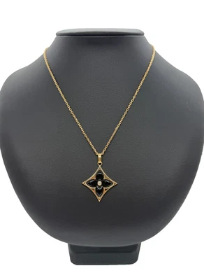 Colgante Louis Vuitton 'Blossom' XL estrella de diamantes de ónix oro de 18 quilates 35" R $8350 Foto 1 de 4