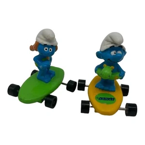 Schlümpfe Hardees Kinder Mahlzeit Schlumpfine Surfen Skateboard Schlumpf Spielzeug 1990 Applaus - Bild 1 von 3