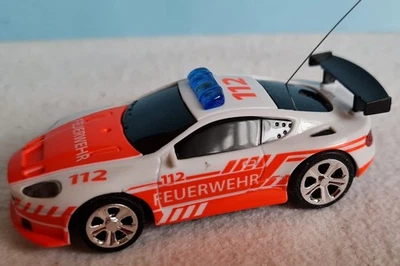 Porsche 911 Carson NANO RACER mit Fernsteuerung, 27 MHz 1:60 mit OVP - Bild 1 von 4