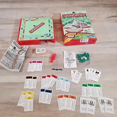 Grab And Go Monopoly Travel Game by Hasbro 2014 Great Condition Real Estate  - Image 1 of 4