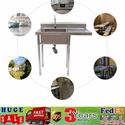 Fregadero utilitario de acero inoxidable con escurridor y grifo giratorio 360° Foto 1 de 4