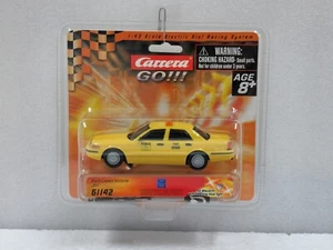 Carrera GO!!! 61142 Ford Crown Victoria Taxi 1:43 Slot Car w/flashing light - Picture 1 of 2