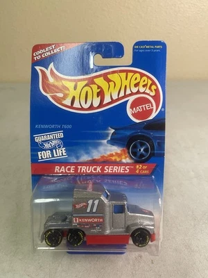 Camión de carreras Hot Wheels #381 1996 serie 2/4 Kenworth T600 plateado con GDYR negro 7 velocidades Foto 1 de 2