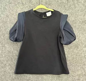 Top elegante manga corta abullonada iridiscente azul marino talla 7 de Zara para niñas - Imagen 1 de 5