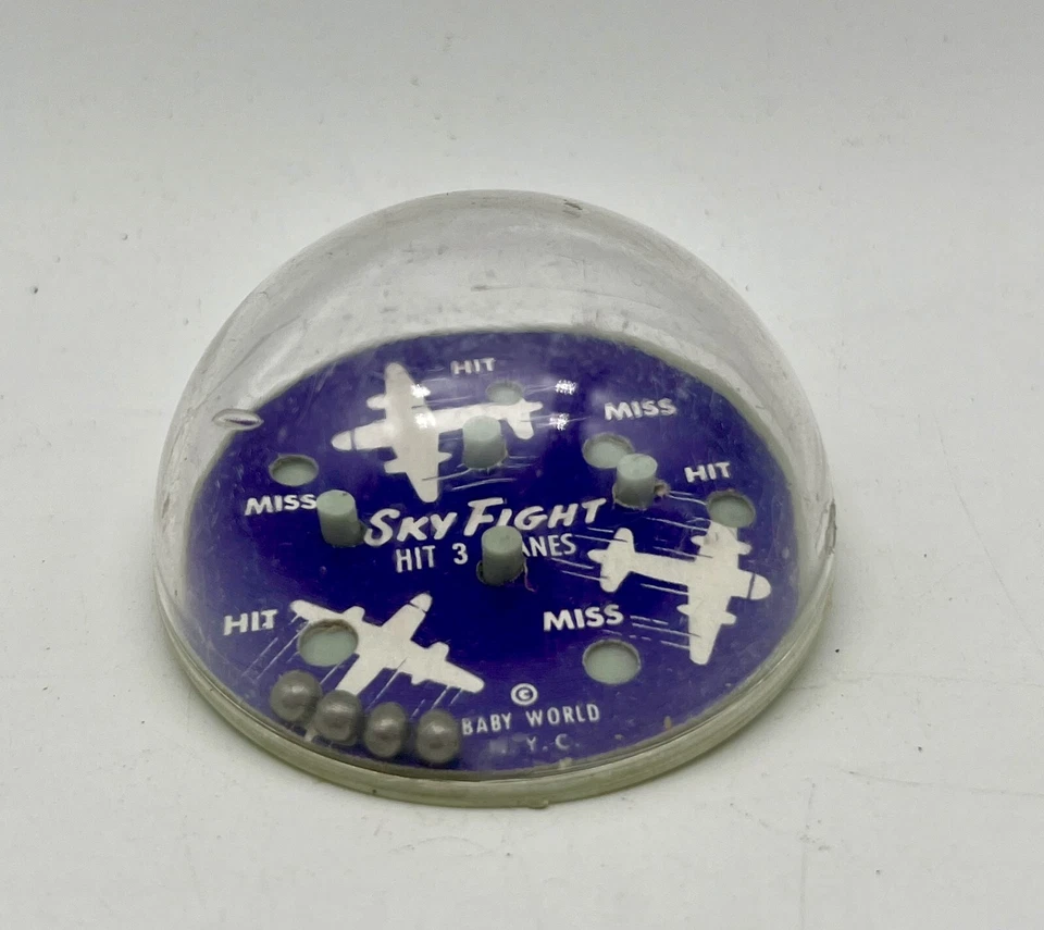 Vintage SKY FIGHT Handheld Metal Ball Small Toy Plane Game by Baby World N.Y.C. - Image 1 of 4