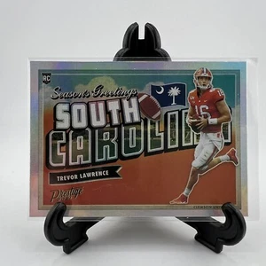2021 Panini Prestige - Seasons Greetings #SG-1 Trevor Lawrence (RC) - Picture 1 of 2