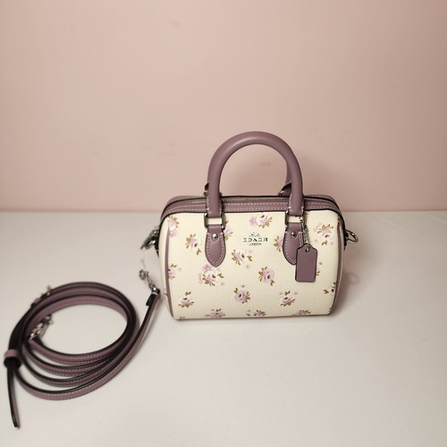 Borsa a tracolla Coach CAL69 Mini Rowan nuova con etichette in pelle tela stampa floreale viola