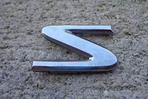 Nissan S trunk emblem badge decal logo Altima Sentra OEM Factory Genuine Stock - Picture 1 of 1