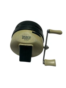 Carrete de pesca vintage Zebco 404 pie de metal Spincast Spincasting hecho en EE. UU. - Imagen 1 de 4